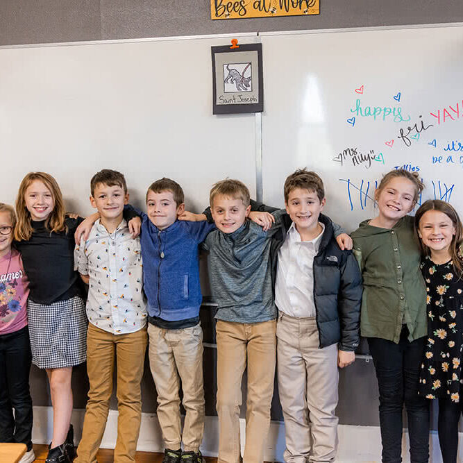 Kids lined up in front of classroom